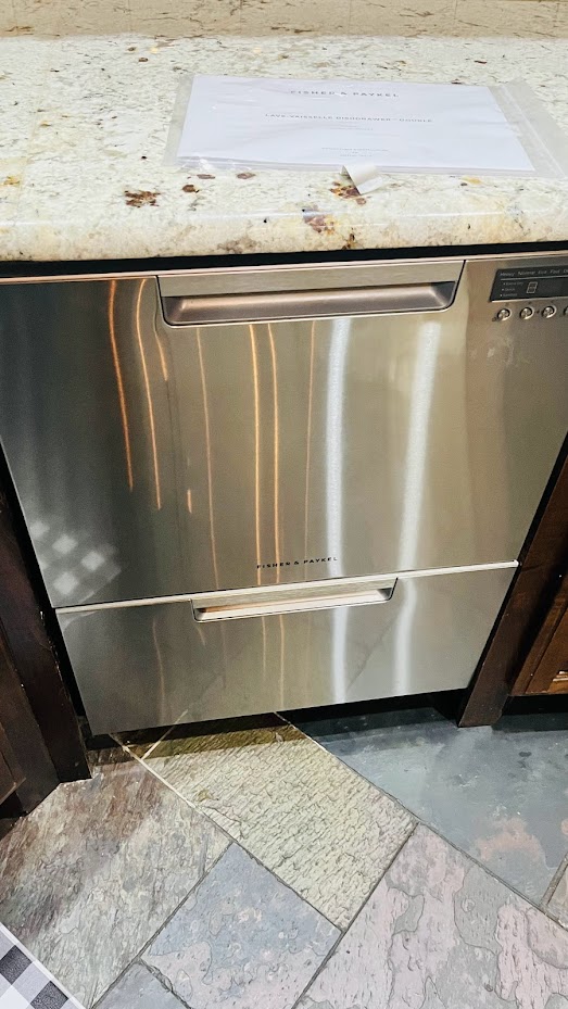 Appliance Repair Services in Edmond & OKC 5 Stainless double-drawer dishwasher installed under a granite countertop
