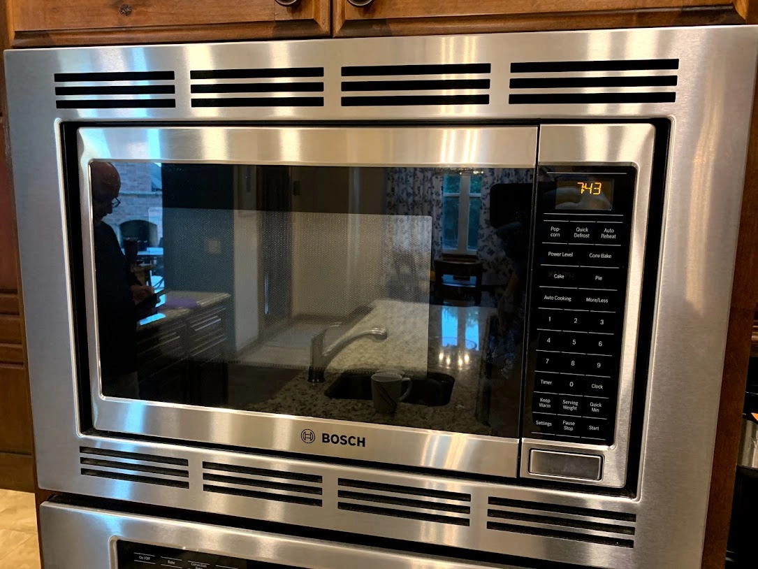 Microwave oven repair in Edmond & Oklahoma City 2 Stainless Bosch built in microwave above a wall oven.