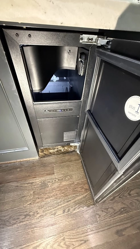 Open Marvel ice machine with ice bin visible.