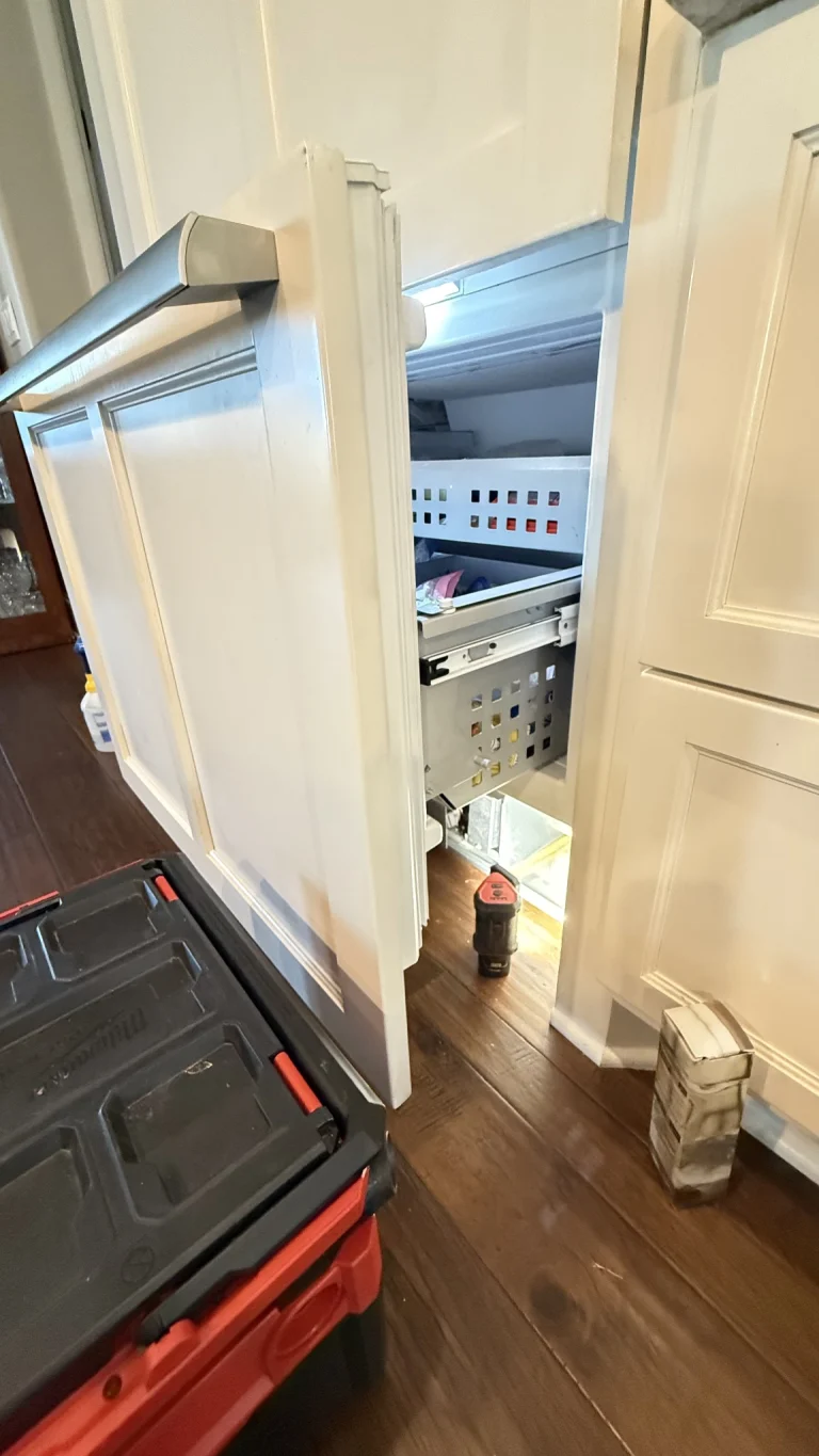 Thermador refrigerator being repaired and serviced in Edmond, Oklahoma.