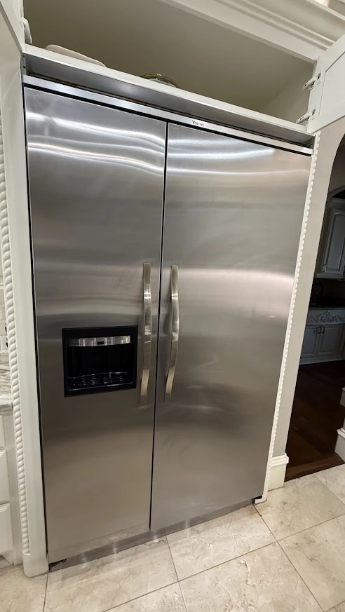 Built in Viking side by side refrigerator in a kitchen.