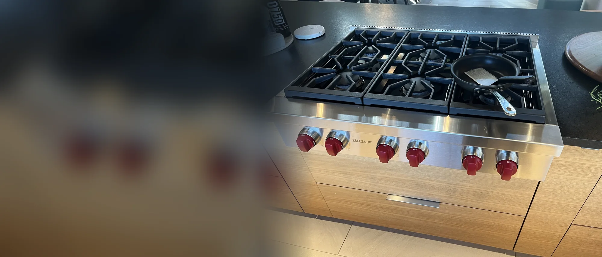 Wolf gas rangetop with red knobs