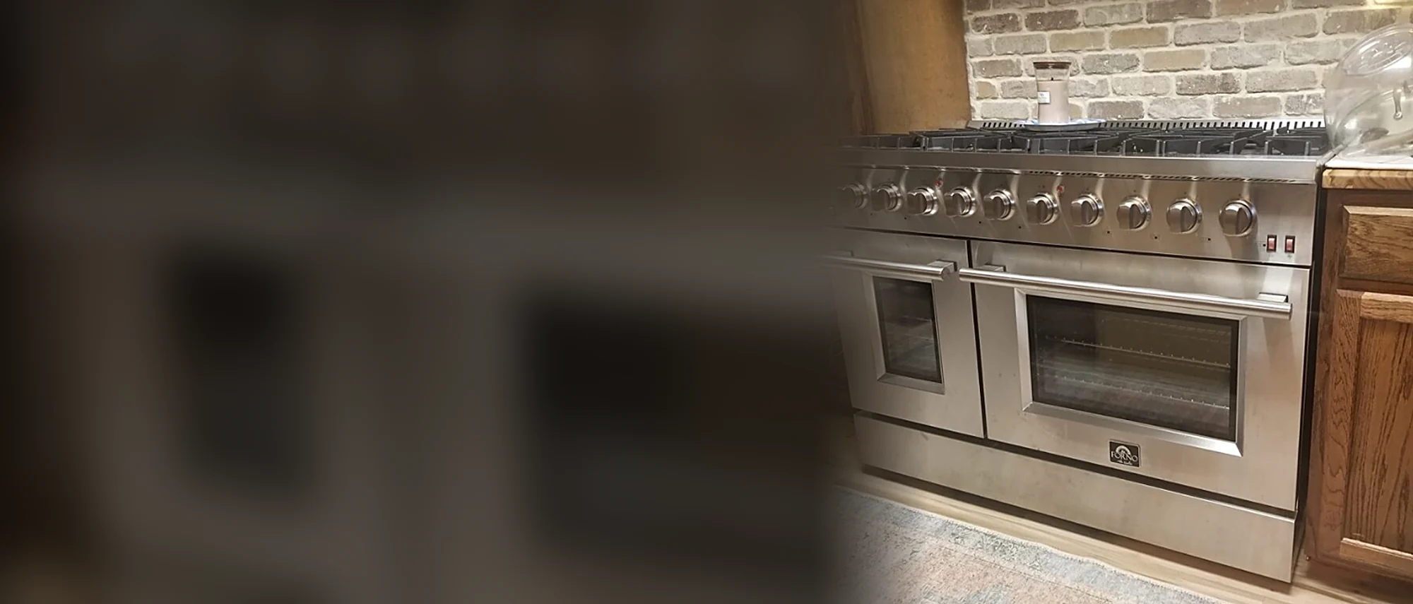 Stainless Forno double-oven gas range in a kitchen