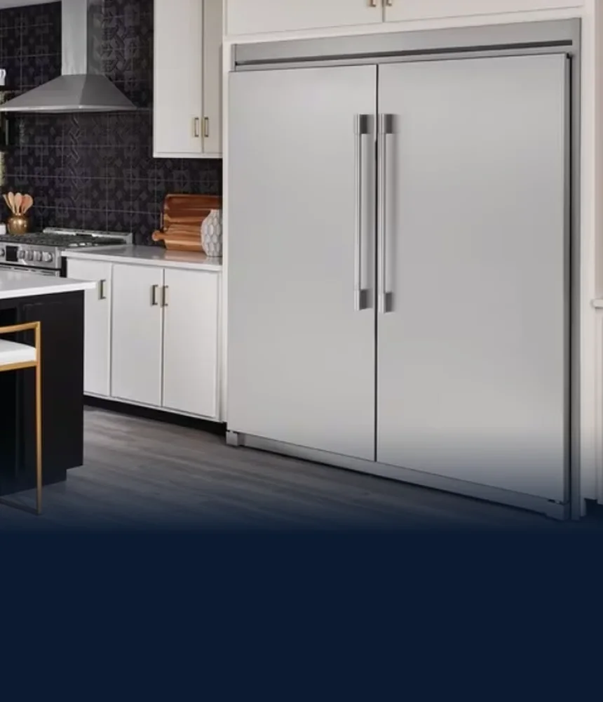 Stainless Frigidaire refrigerator and freezer columns in a kitchen