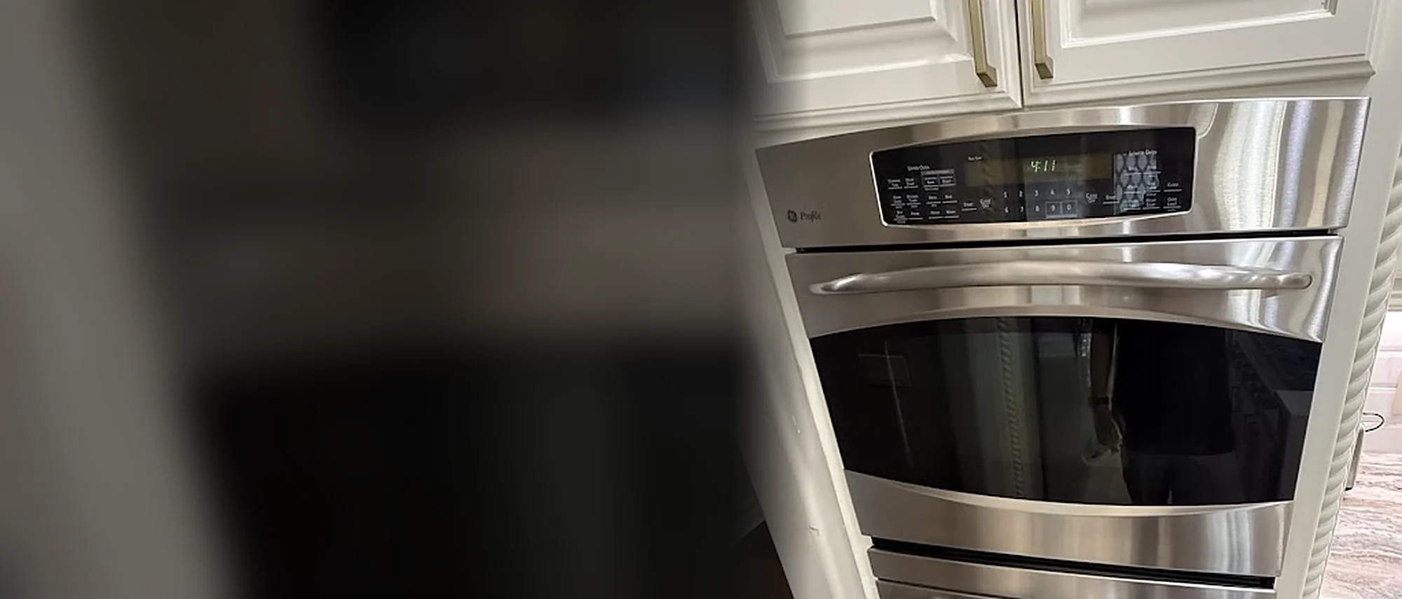 GE built-in wall oven with a stainless control panel
