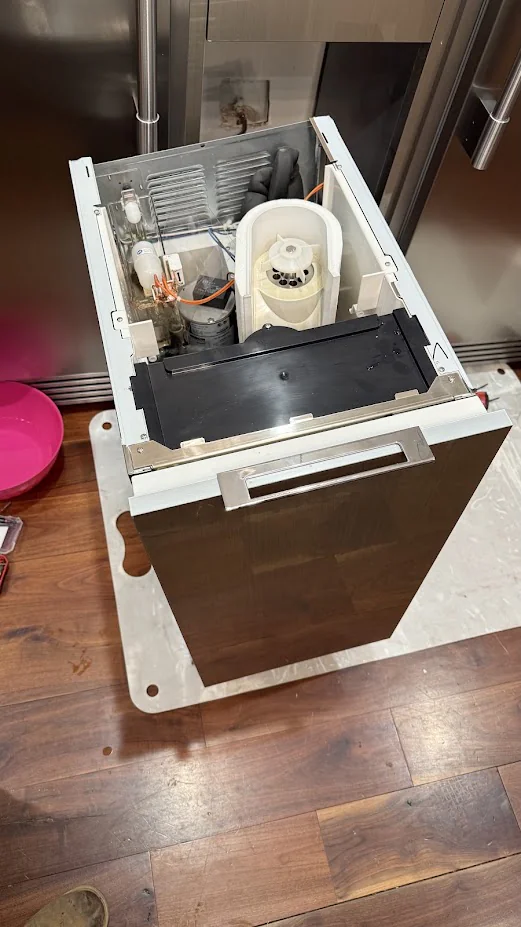 Ice Maker & Ice Machine Repair in Edmond & Oklahoma City 9 Undercounter ice machine pulled out with parts exposed.