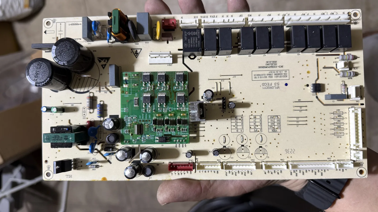 Appliance electronic control board with capacitors, relays and electrical connectors