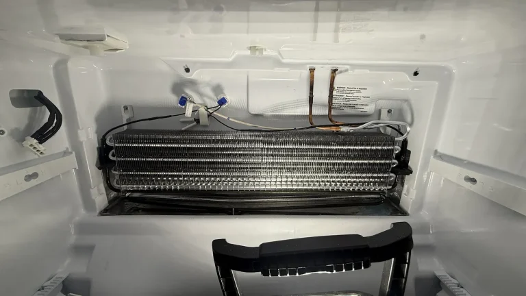 Refrigeration evaporator and tubing inside an open cabinet