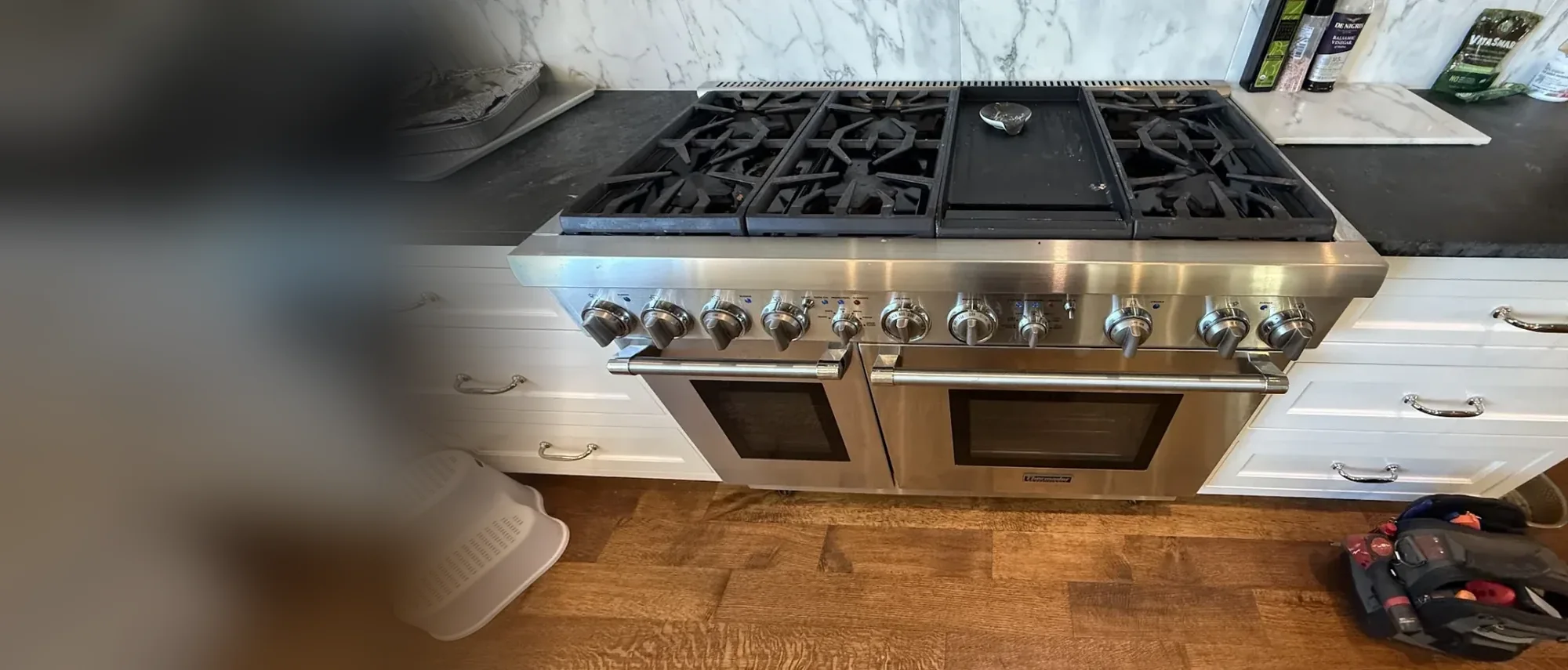 Pro-style gas range with griddle and double ovens