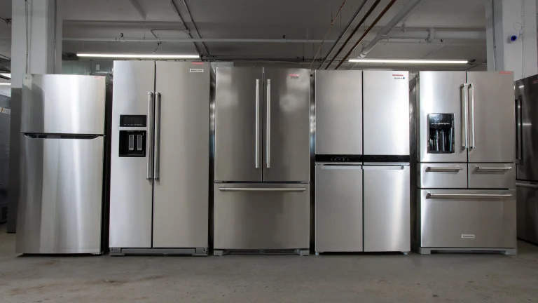 Row of stainless steel refrigerators, including side-by-side, French-door and top-freezer models