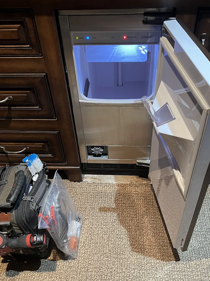 Ice Maker & Ice Machine Repair in Edmond & Oklahoma City 4 Undercounter ice machine open with a tool bag in front.