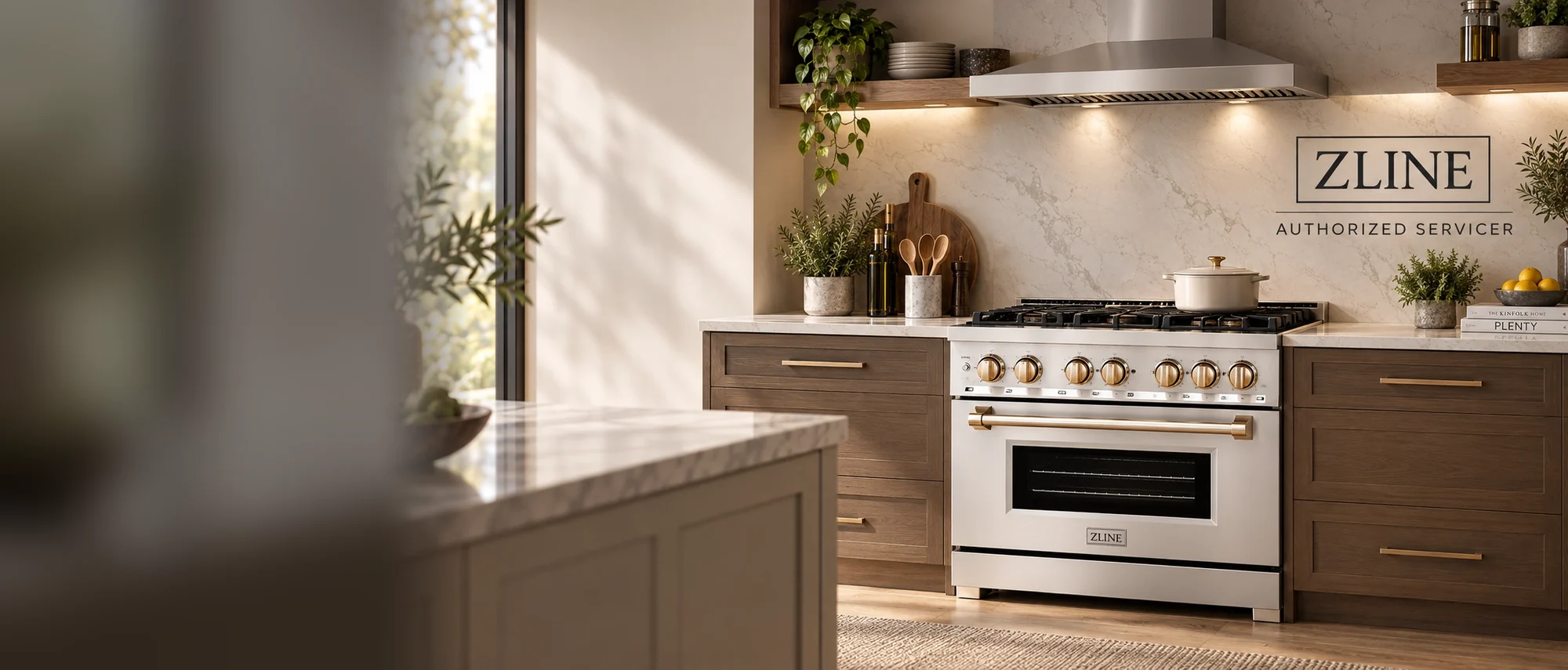Stainless ZLINE range with gold knobs and handle between wood cabinets